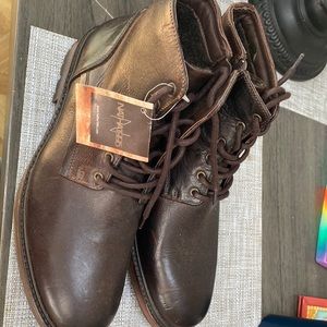 Never worn tags on Men’s boots